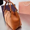 2022 Designer Bags Women's Bag Cowhide Mcgraw Single Shoulder Messenger Handbag Deformed Bucket Tote Bag 318C