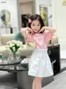 Classics Girls Hobe Costumes Summer Baby Tracksuit Kids Designer Clothes Taille 110-160 cm Coeur T-shirt rose imprimé et jupe courte 24april