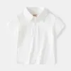 T-shirts Summer Boys Polo T-shirt Coton Polo Collier préscolaire bébé T-shirt Childrens T-shirtl240509