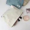 Bolsas de cosméticos Bolsa de produtos para a pele portátil Bolsa de higiene pessoal Organizador de cor sólido Corduroy Bolsa de maquiagem