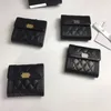 Designer des femmes du portefeuille Sac Boy Portefeuille Black Coin Purse Caviar Leather Coule Velle d'agneau Agnes Antique Gold Silver Metal Hardware Trifold 297p