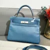 Top Ladies Designerin Kiaelliy Bag New 28 Duck Blue Leder Silber Schnalle T-Cut Handheld-Tasche