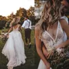 2021 Sexy Lace Deep V Neck Backless Beach Wedding Jurk Sweep Train Tule Mouwloze Boho Bridal Jurken 0509