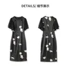 Robe lambrissée à imprimé floral noir manche courte rond rond jacquard robes décontractées au genou W4M065410