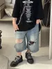 Pantalon Vêtements pour enfants 2024 Été coréen Blue Loose Hole Jeans Mode décontractée-veau de veau pour garçons et filles extérieure