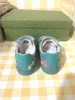 Nieuwe baby sneakers kleurrijke champignonpatroon kinderschoenen maat 26-35 hoogwaardige merkverpakking meisjes schoenen ontwerper jongens schoenen 24 mei