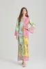 Letnia bohemijska świąteczna luźna sukienka maxi dla kobiet o długim rękawie o-dół kwiatowy druk z boku dzielone muzułmańską szatę długie vestidos 240423
