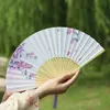 Produits de style chinois Fan fan féminine Qipao Hanfu accessoires de danse ventilateur chinois ancien fan pliage fan de fleur de fleur de fleur de soie