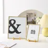 Plaques décoratives 2pcs Stands pour affichage Twisted Iron Golden Book Stand Picture Frame Small Neel Metal