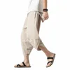 Pantalon pour hommes Men Summer Cropité Impression à rayures verticales avec une taille de cordon élastique Carrot pour le streetwear
