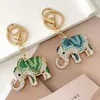 Keychains Lonyards exquis mignons femmes longs éléphant résidus enroule de clé clés sac clé pendentif thaïriste des cadeaux touristes souvenirs bijoux J240509