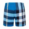 Shorts, heren geruite zomer nieuwe veelzijdige trend strandbroek, modieuze bijgesneden broek, los en casual