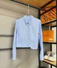 Chemises de chemisiers pour femmes Designer 2024 Triangle d'été Polo Bouton Polo Top Top Summer Coton Shirt Cool and Cute TUU6