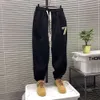 Pantalons pour hommes Joggers Panneaux Spring Spring Men's Student Brand Trendy Sports Long Loose Tie Leggings For Men Trawstring Slim Slims