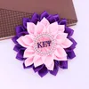 Broschen hergestellt lila rosa Seidenband Blume Corsage Griechische Gruppe Epsilon Psi Militärische Schwesternschaft Pin Brosche für Dame