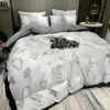 Couvrette de couette en coton Lit en coton Douche de lit Four Seasons Single Single Dormitory Quilt Simple