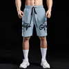 Heren shorts Nieuwe casual shorts Heren Summer Men Hot Cargo Simple Letter Solid bord mannelijk merk bodybuilding kleding homme maat m-3xl t240508