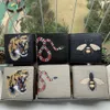 Herenontwerpers Animal Korte portemonnee Leer Zwarte slang Tiger Bee Wallets Women Long Style Luxury portemonnee portemonnee kaarthouders met cadeau BO 225S