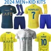 QUALITÀ PREMIUM 23 24 AL NASSR FC Maglie da calcio Ronaldo Kits Away Kits CR7 Gonzalo Martinez Talisca Ghislain Konan Vincent Aboubakar Men Kids Football Shirt