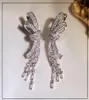 Luxury Shining Crystal Sweet Bowknot Designer Boucles d'oreilles Stud Long Tassel pendentif CZ CZ Diamond Boucle d'oreille Bouilles de fête Mariage 6560616