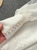 Partykleider Vintage Blume Stickerei hohl Out Spitzen weißes Kleid Frauenständer Halsband Langes Laternenhülsen Perlen Knöpfe Vestidos
