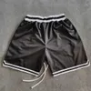 Short masculin short de basket-ball imprimé en flash état noir plus trilleux avec poches à fermeture éclair