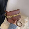 Niche-ontwerp, high-end modieuze draagbare kleine dames handtas 2024 Nieuwe trendy en veelzijdige single schouder crossbody tas voor vrouwen