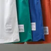 Pantaloni da uomo pantaloncini sportivi a maglia americana per estate alla moda elastico sottile elastico gamba dritta sciolta di fitness medio casual split