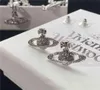 Önhängen 21 Empress Dowager -stil nana med en modeflickatillbehör, mångsidig cool metall diamantörhängen1825361