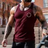T-shirts masculins Été Nouvelle tendance décontractée en tricot vertical rayures fitness sports décontractés pour hommes slims