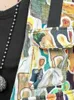 Pantalon de deux pièces pour femmes 2024 printemps d'été personnalisé de dessin animé en jean gest de jean suspendu entre deux pièces Femmes Loose élégante LX757