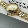 Neue Western Kaiser Dowager Klassiker Anhänger Gold Key Quarz Steel Band Womens Uhr