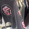 レッドサイコロプリントセントマイケルTシャツカジュアルメンズ服ビンテージストリートウェアルーズコットン長袖Tシャツ男性女性240428