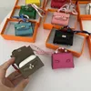 Компания для ключей Женщина -дизайнерские аксессуары сети H Home Mini H Bag Keyrings милый пакет для наушников премиум кожаная творческая автомобильная цепочка