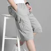 Mäns shorts Mens Cargo Shorts Knäbyxor Pickade fickor Summer Bomullshorts klättring Jogging Elastic midja Sportwearl2405