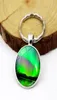 Keychains WG 1pc Northern Lights Aurora Time Gemstone Keychain Cortes de trèfle Pendent Metal Cabochon Keyring Accessoires créatifs Gift14182151