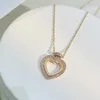 Collane a ciondolo 925 Gioielli di moda a mezza zircone del cuore di pesca argento sterling (DJ2311)