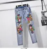 Suisse en denim de style européen tenue de mode femme fleur paillette de jean veste courte jeans jeans pantalon deux pièces féminine 240509