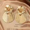 Boucles d'oreilles étalon vintage gold couleur métallique fleur personnalité féminine haut de gamme haut de giron ginkgo Tempérament des oreilles