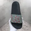 Designer glissades masculines pantoufles de sandale d'été sandale de plage glissade plate-forme plate plate-forme de mode maison de mode tongs tongs à rayures en rupture de tigre de pantoufle causale