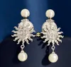 Designer Sun Sgano gli orecchini per donne Luxury Silver Copper Pearl Sun Earring Gioielli Regali di gioielli