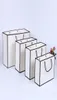 Sacchetto di carta kraft bianco kraft addensare abbigliamento regalo confezione da confezionamento sacchetto di carta regalo con manici 6209954
