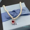 Chaînes de bijoux de créateurs pour femmes colliers pendentifs uniques de design Niche Collier de perle de suspension élégante cadeau commémoratif