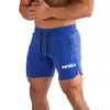 Męskie szorty podwójne zamek błyskawiczne szorty fitness męskie nowe runnshorts męsne treningi fitness Summer Tchedable Szybkie suche spodenki J240510