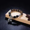 Charm Bracelets Hot Sale Men Women 10mm Bracelets 7 Chakra Healing Balance Beads Heart Charm Bracelet For Female Reiki Prayer Stones Jewelry Y240510