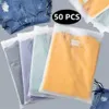 50pcs Toptan Buzlu Mat Giysiler Ambalaj Fermuar Çantaları Plastik Mühürlü Tshirt iç çamaşırı 240510