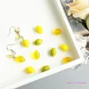 Boucles d'oreilles en peluche végétale de citron jaune orage délicat d'agrumes de bijoux à thème d'agrumes