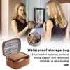 Sacos de armazenamento Caixa de viagem reforçada Capacidade de viagem Saco de cosméticos de couro falso à prova d'água com escova de maquiagem para mulheres