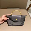 Luxury Handbag Designer Shoulder Bag Mini Casual Womens Bag Bag Short Handle Handheld Bag Mini Dumpling Bag6RWN