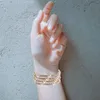Braccialetti di fascino avvolto bracciale a spirale personalizzato Pearl for Girls Teen Trendy Gioielli da polso Gioiello Metal Braggletta
